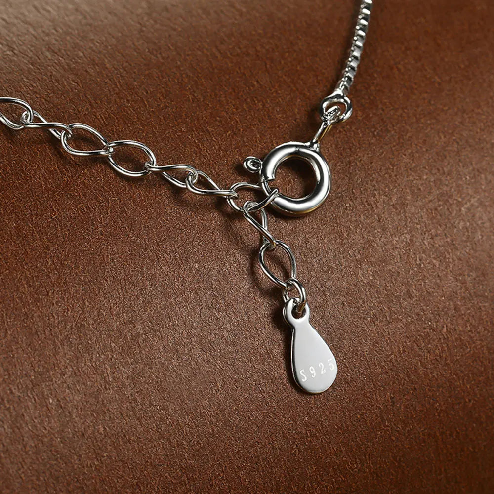 Pear Pendant Necklace — Moissanite & Zirconia Options, 925 Silver, detail view